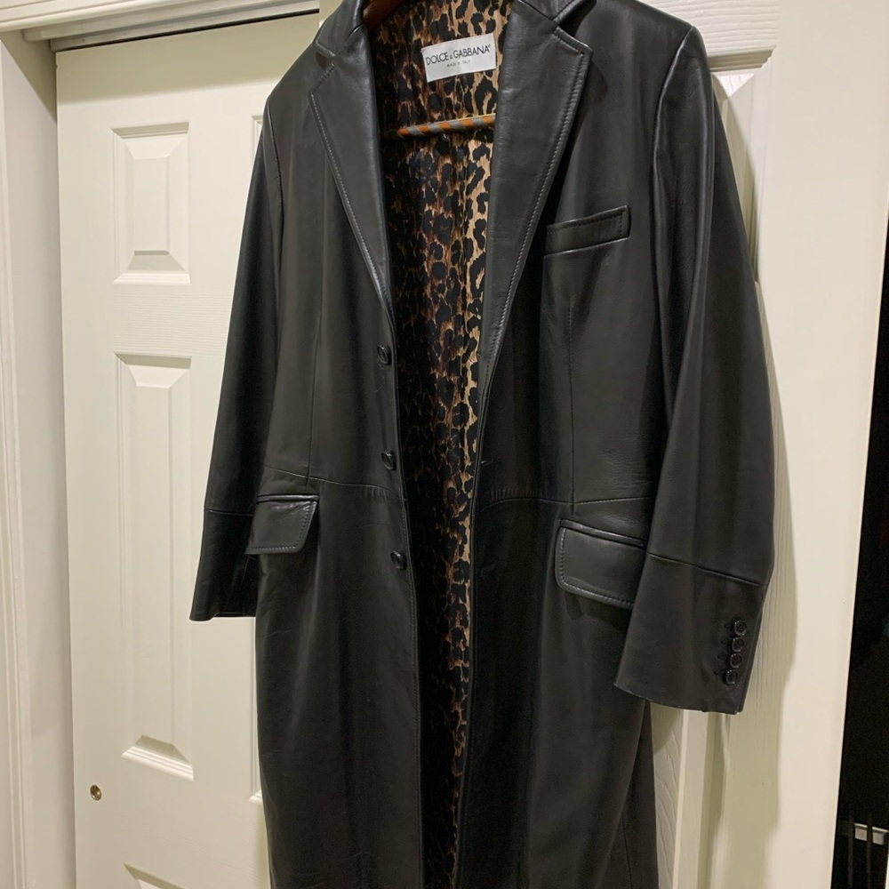 Black Leather coat. Leopard print inside. 3/4 length. Gorgeous/great condition.